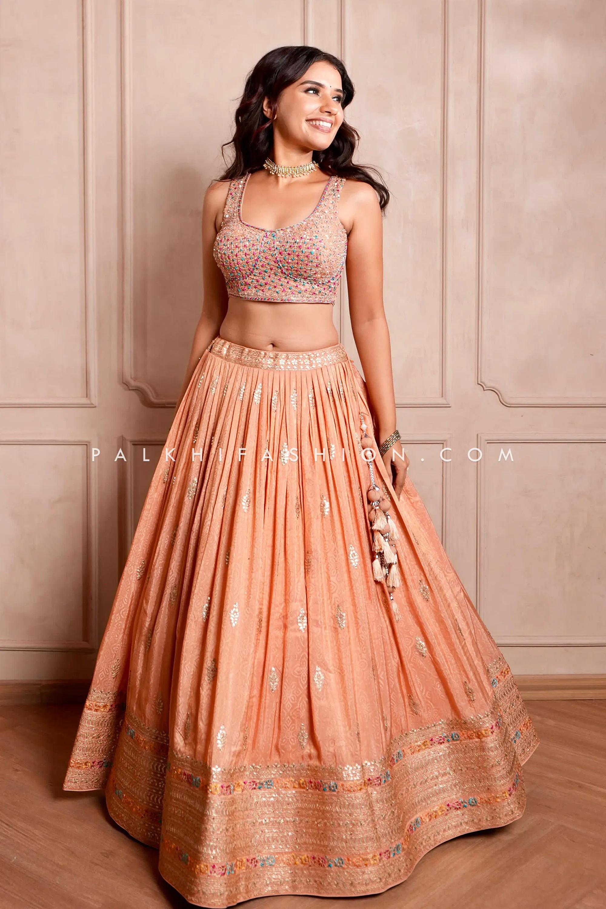 A Regal Ensemble: Peach Designer Lehenga Choli